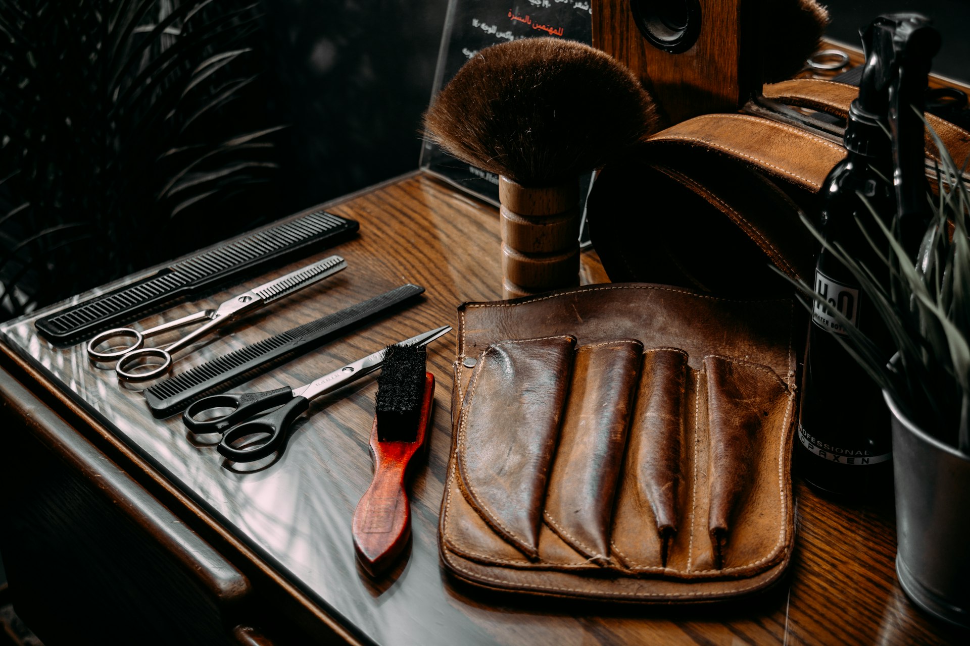 a purse and knife on a table